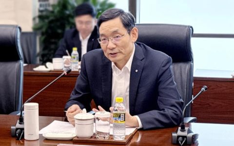 中国建材集团周育先拜访中建集团