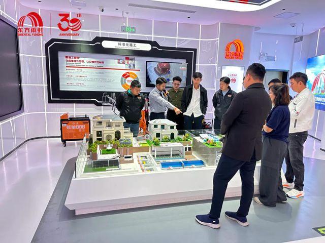 柬埔寨客户再访东方雨虹花都生产研发物流基地，高品质产品赢得深度信赖